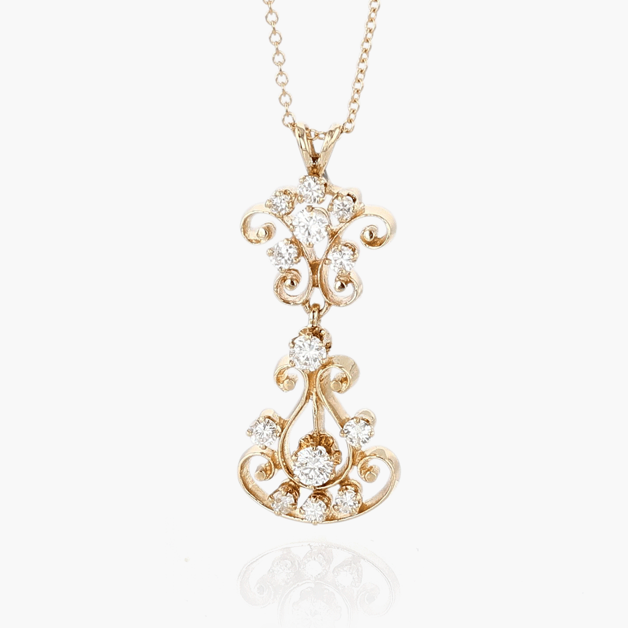 Vintage 14k gold and store diamond pendant