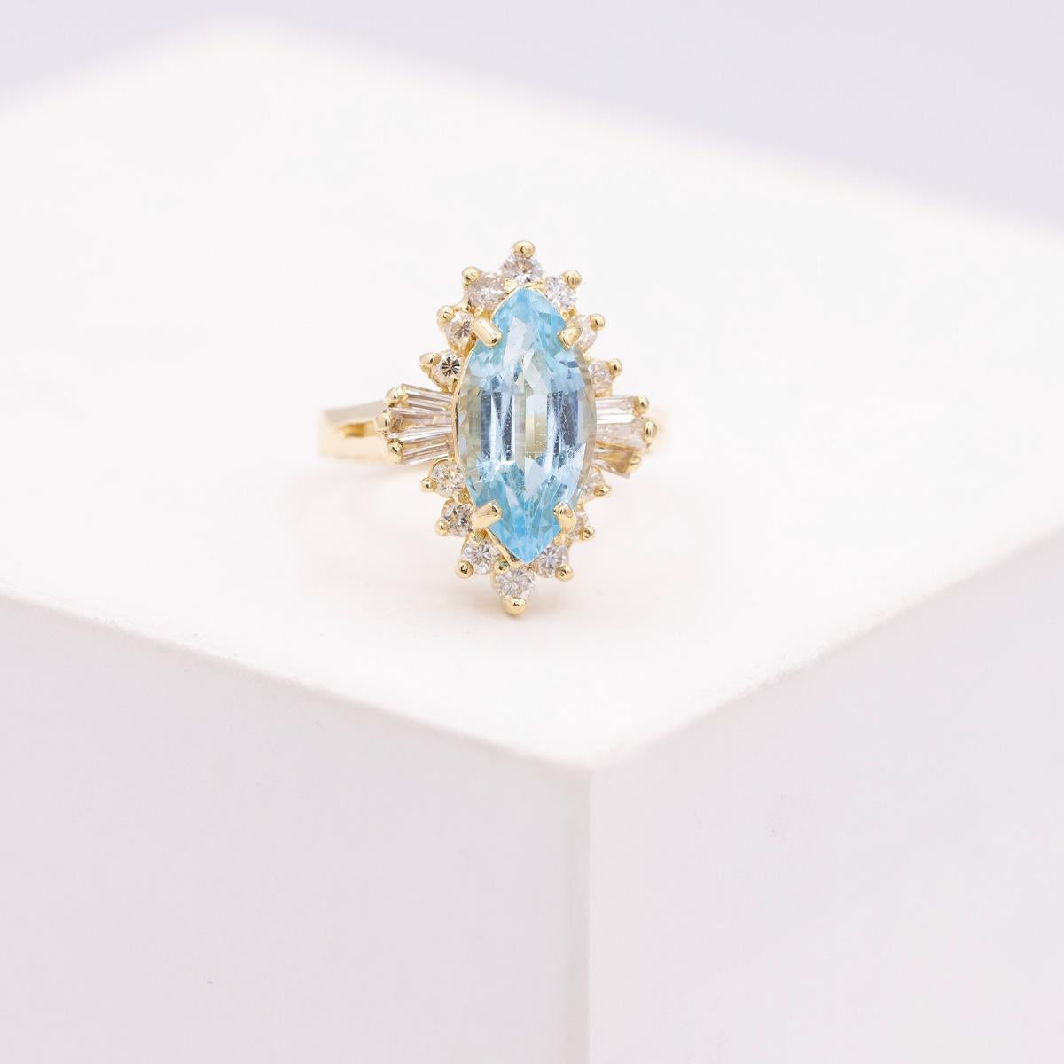 14KT Gold Blue Topaz and Diamond Ring