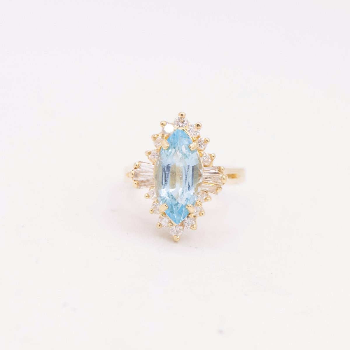 14KT Gold Blue Topaz and Diamond Ring