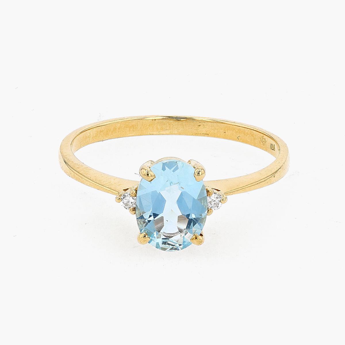 18KT Gold Aquamarine and Diamond Three Stone Ring